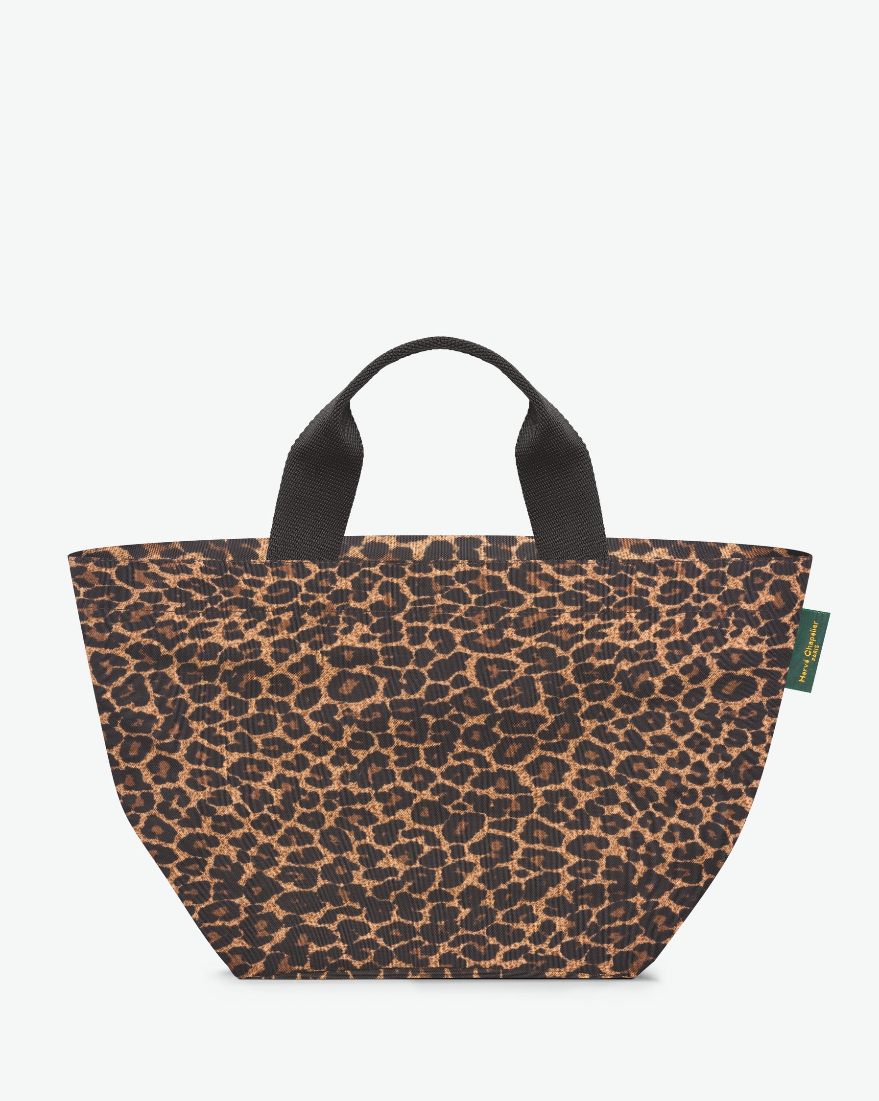 Packshot of a 1027F tote bag with short polyprop handle and a zipper and an inside pocket. The bag is made of printed nylon in a medium size. Sac cabas a poignees courtes en nylon imprime dans un format M