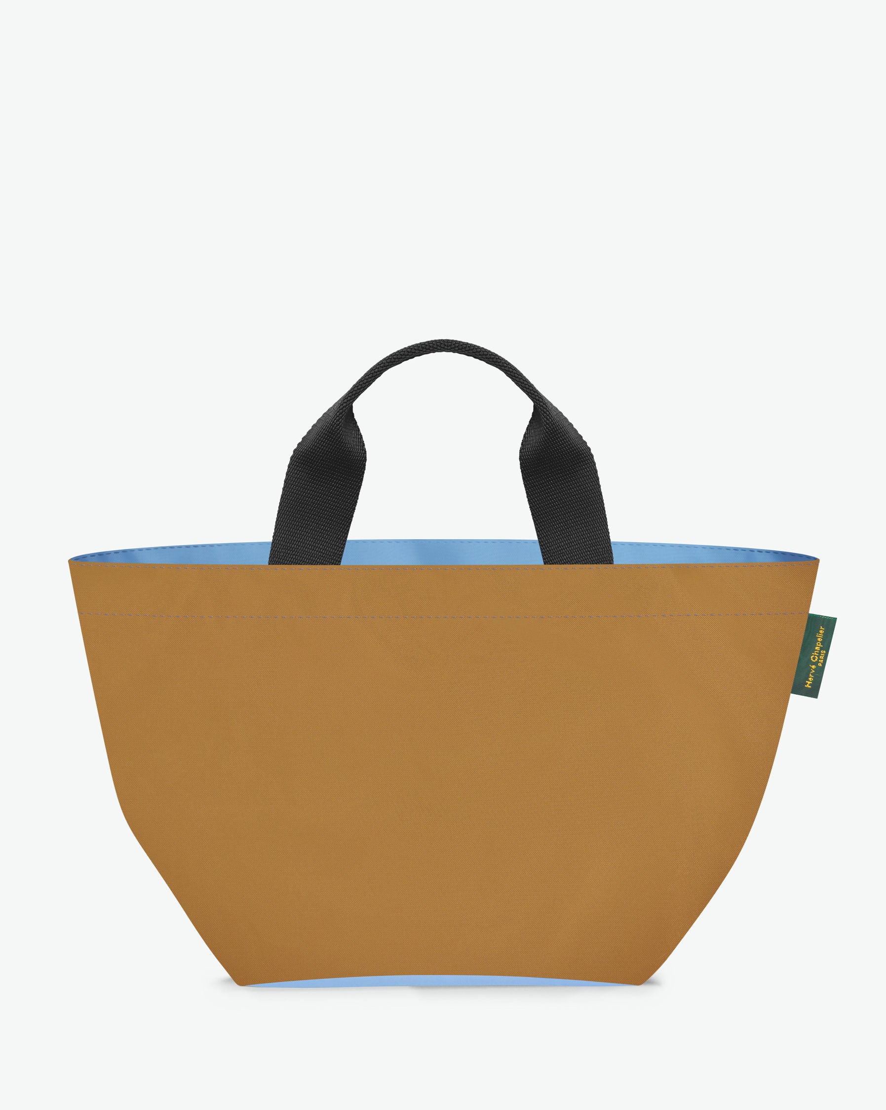 Sac à main cabas de couleur en nylon bicolore, à fond carré et dans un format M. Présence d'un double zip, de poignées courtes noires en polypropylène, et d'une étiquette de marque verte.