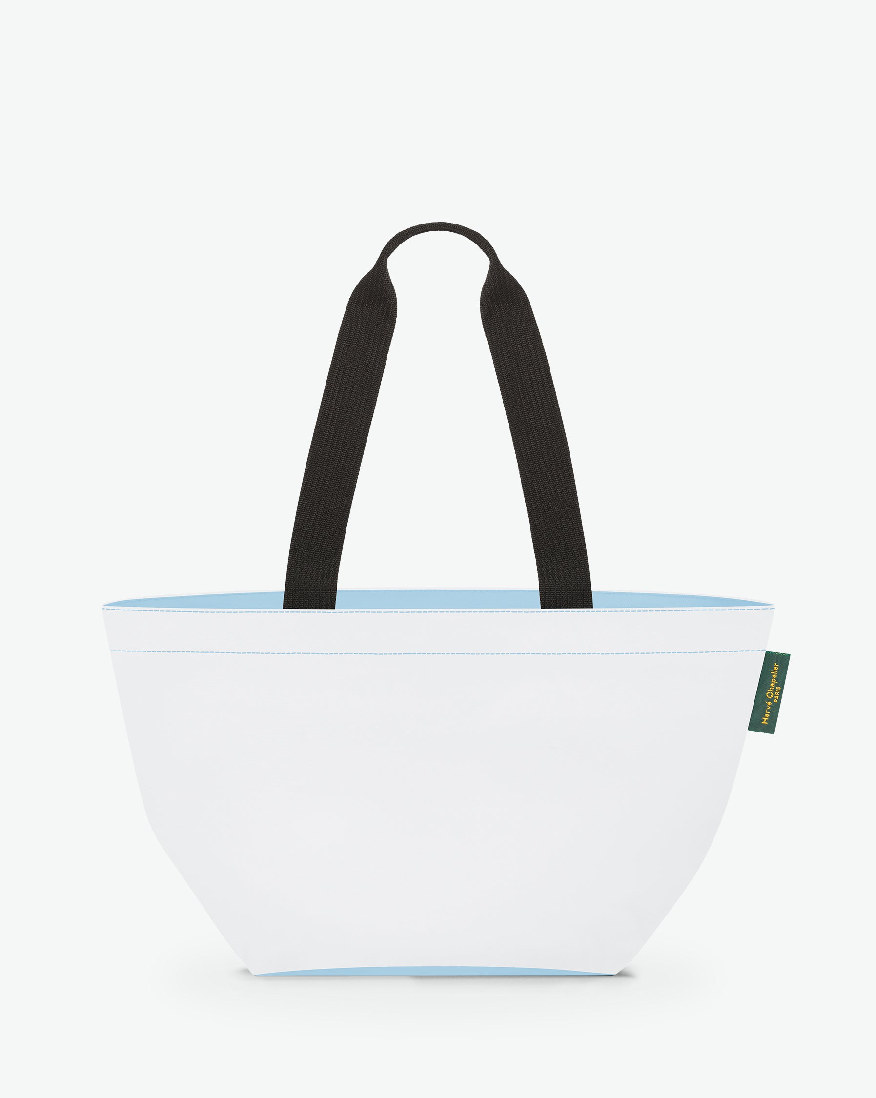 Sac cabas porté épaule de couleur en nylon bicolore, à fond carré et dans un format M. Présence d'un double zip, d'anses longues noires en polypropylène, et d'une étiquette de marque verte.