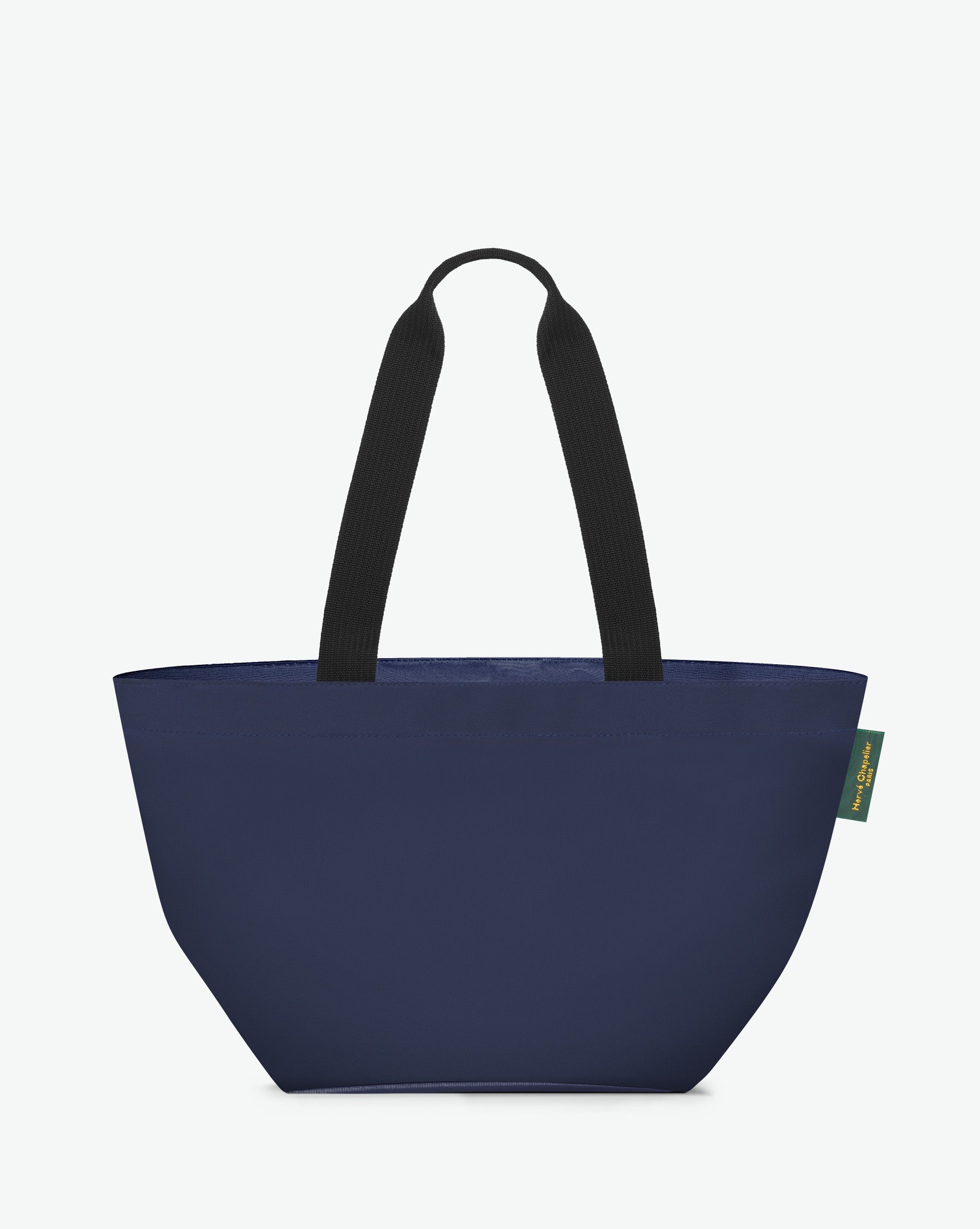 Sac cabas porté épaule de couleur en nylon bicolore, à fond carré et dans un format M. Présence d'un double zip, d'anses longues noires en polypropylène, et d'une étiquette de marque verte.