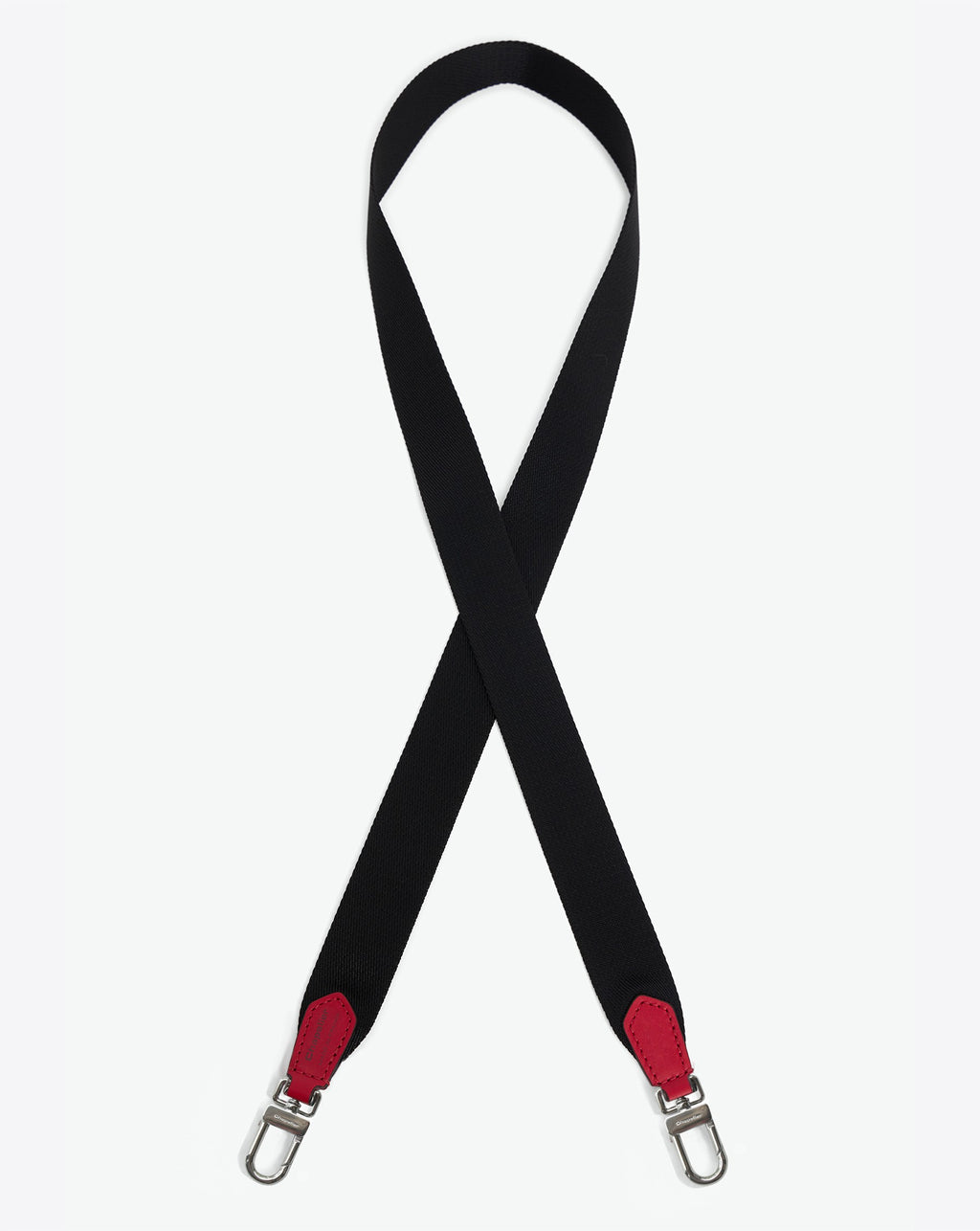 Packshot of a 1662A shoulder strap to hang on Hervé Chapelier bags. The strap is made of leather and polyamide in a medium size. Lanière bandoulière polyamide et cuir dans une taille M