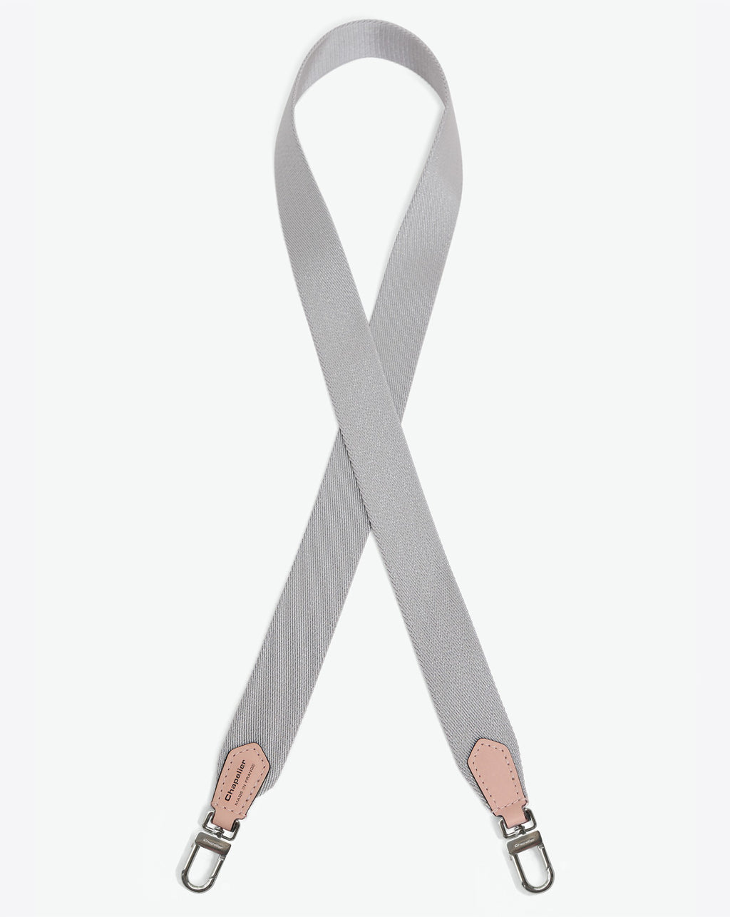 Packshot of a 1662A shoulder strap to hang on Hervé Chapelier bags. The strap is made of leather and polyamide in a medium size. Lanière bandoulière polyamide et cuir dans une taille M