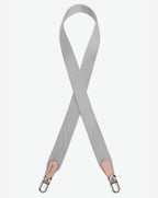 Packshot of a 1662A shoulder strap to hang on Hervé Chapelier bags. The strap is made of leather and polyamide in a medium size. Lanière bandoulière polyamide et cuir dans une taille M