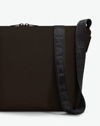 Packshot of a 1754CJQ shoulder crossbody bag with a large and long labeled “Chapelier” handle in polyamide The bag is made of solid polyamide, in a rectangular size Sac bandouliere epaule en nylon uni taille L