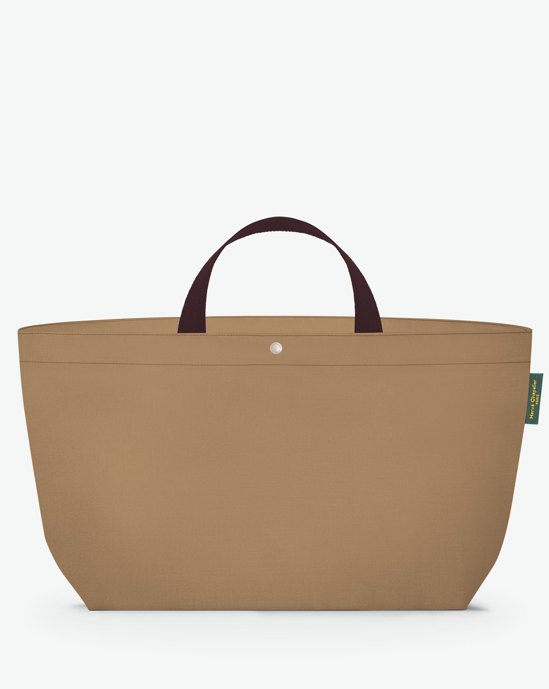 Packshot of a 1838C travel bag rectangular bottom with short polycotton handles and a zipper and an inside pocket. This extra-large bag is made of polyamide. Sac cabas a poignees courtes en polyamide uni format XL