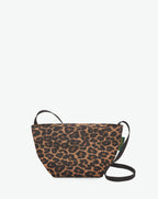 Packshot of a 1927F shoulder crossbody bag with a long handle in polyamide webbing and a zipper. The bag is made of printed nylon in an extra-small size. Mini sac bandouliere epaule en nylon imprime taille XS