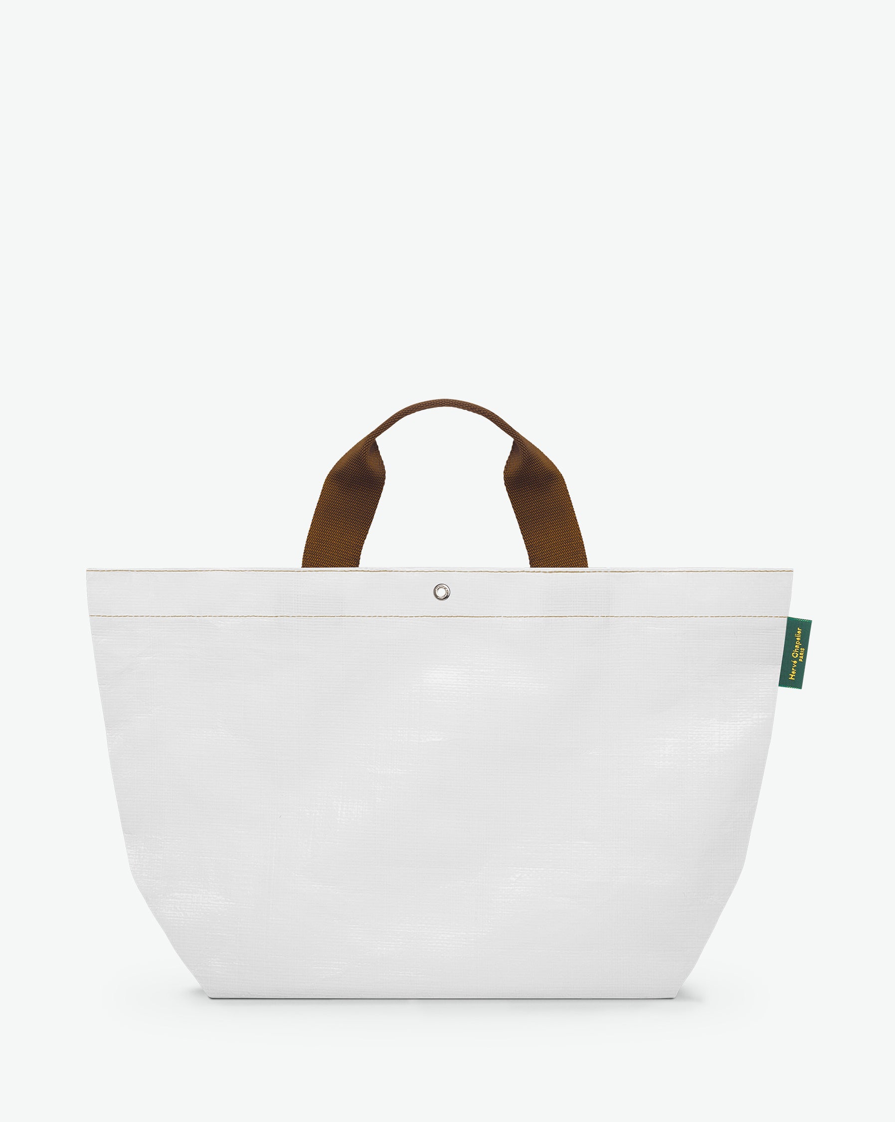 Sac cabas marché coloré en polypropylène, à fond rectangulaire et dans une taille M, aux poignées courtes de couleur en polyamide et à l'œillet décoratif.