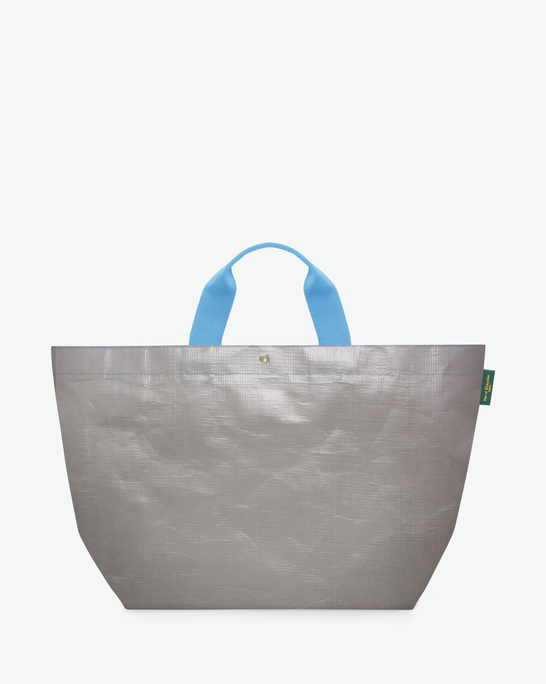 Sac cabas marché coloré en polypropylène, à fond rectangulaire et dans une taille M, aux poignées courtes de couleur en polyamide et à l'œillet décoratif.
