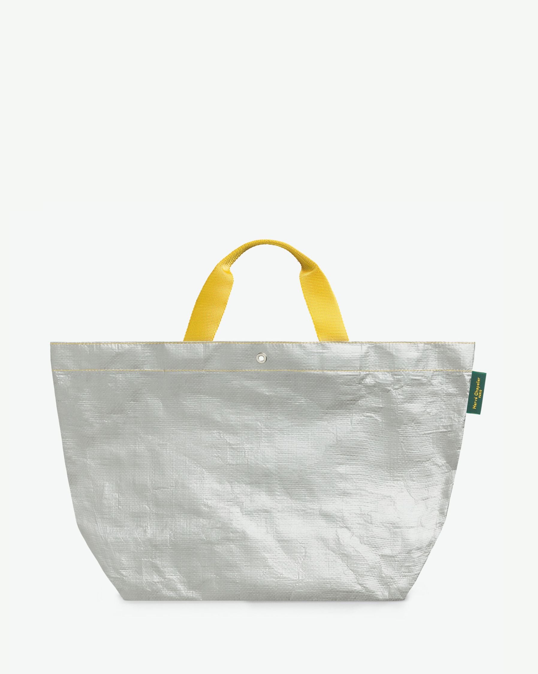 Sac cabas marché coloré en polypropylène, à fond rectangulaire et dans une taille M, aux poignées courtes de couleur en polyamide et à l'œillet décoratif.
