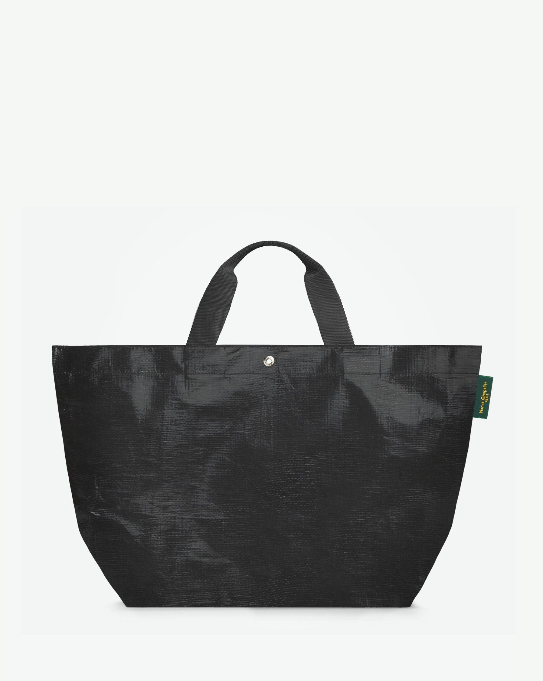 Sac cabas marché coloré en polypropylène, à fond rectangulaire et dans une taille M, aux poignées courtes de couleur en polyamide et à l'œillet décoratif.