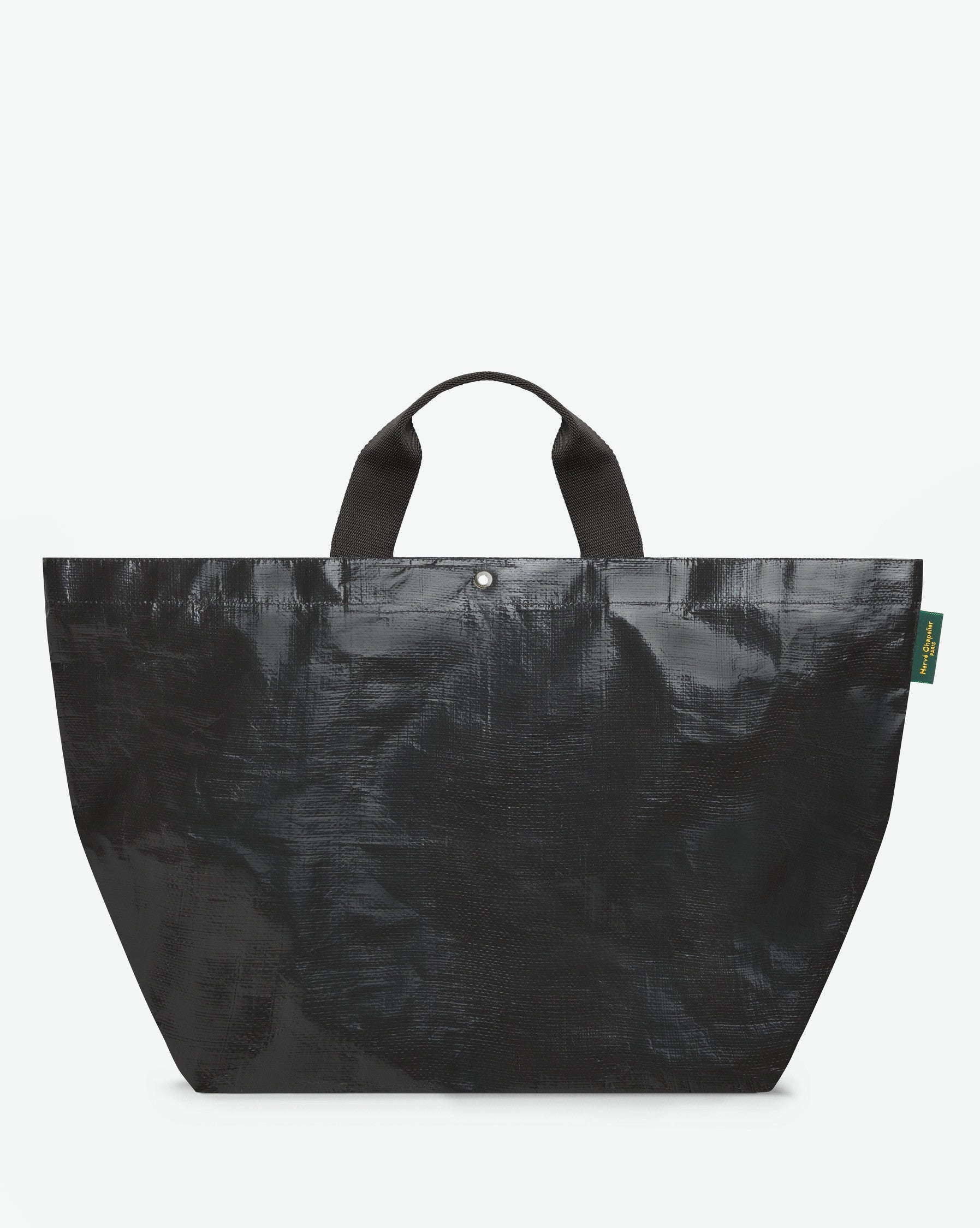 Sac cabas marché coloré en polypropylène, à fond carré et dans une taille XL, aux poignées courtes de couleur en polyamide et à l'œillet décoratif.