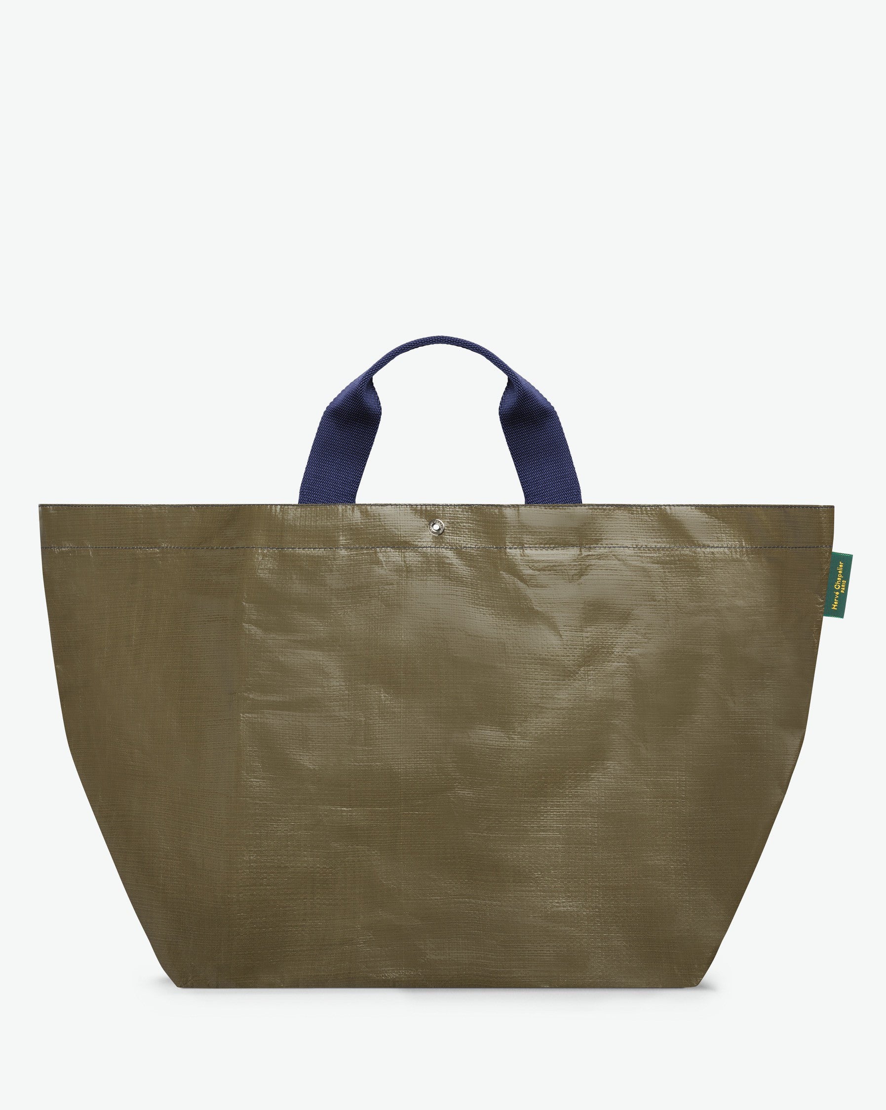 Sac cabas marché coloré en polypropylène, à fond carré et dans une taille XL, aux poignées courtes de couleur en polyamide et à l'œillet décoratif.