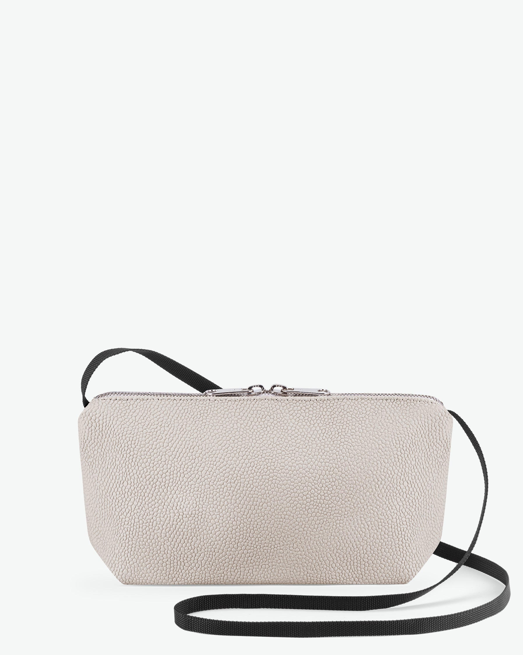Packshot of a 2784G rectangular crossbody bag with a zipper and a long handle in polyamide webbing in a size S. Bag made of pebbled grain coated canvas. Sac bandoulière toile enduite dans une taille S