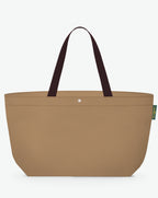 Packshot of a 2839C travel bag rectangular bottom with long polycotton handles and a zipper and an inside pocket. This extra-large bag is made of solid polyamide. Sac cabas a poignees courtes en polyamide format XL