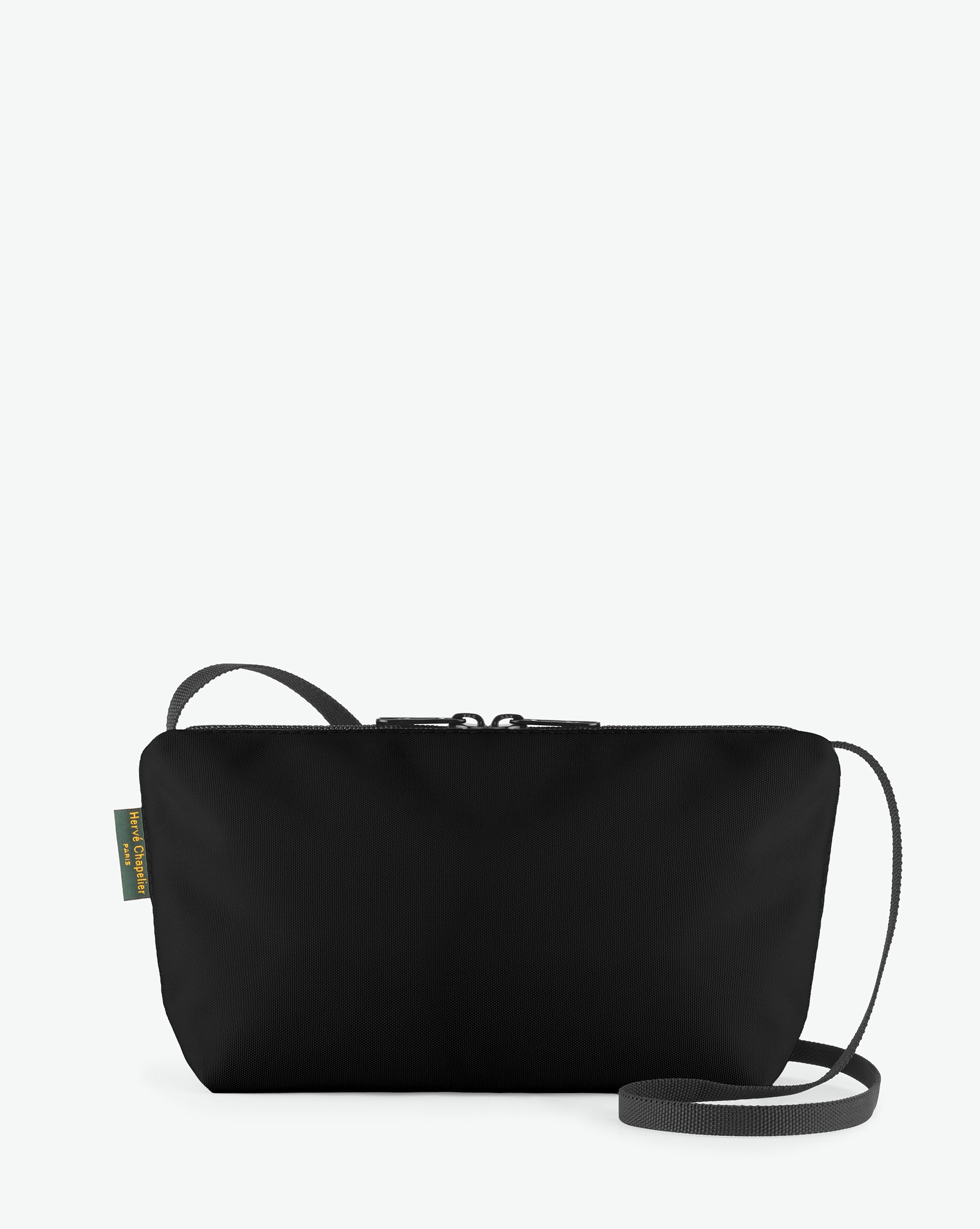 Packshot of a 2884N shoulder crossbody bag with a long handle in polyamide webbing and a zip with double closure. The bag is made of solid nylon, in a rectangular size. Sac bandouliere epaule en nylon uni taille S