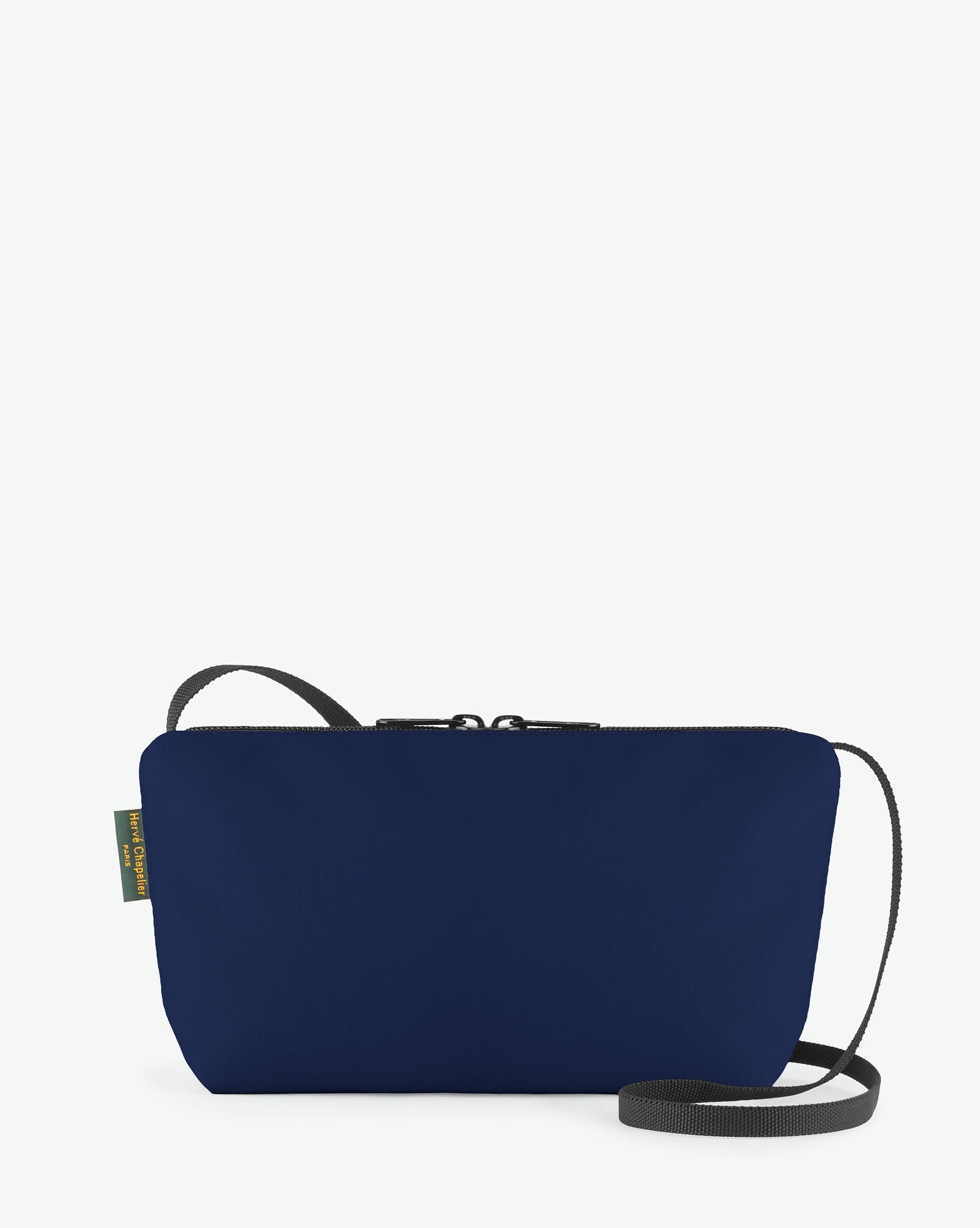 Packshot of a 2884N shoulder crossbody bag with a long handle in polyamide webbing and a zip with double closure. The bag is made of solid nylon, in a rectangular size. Sac bandouliere epaule en nylon uni taille S