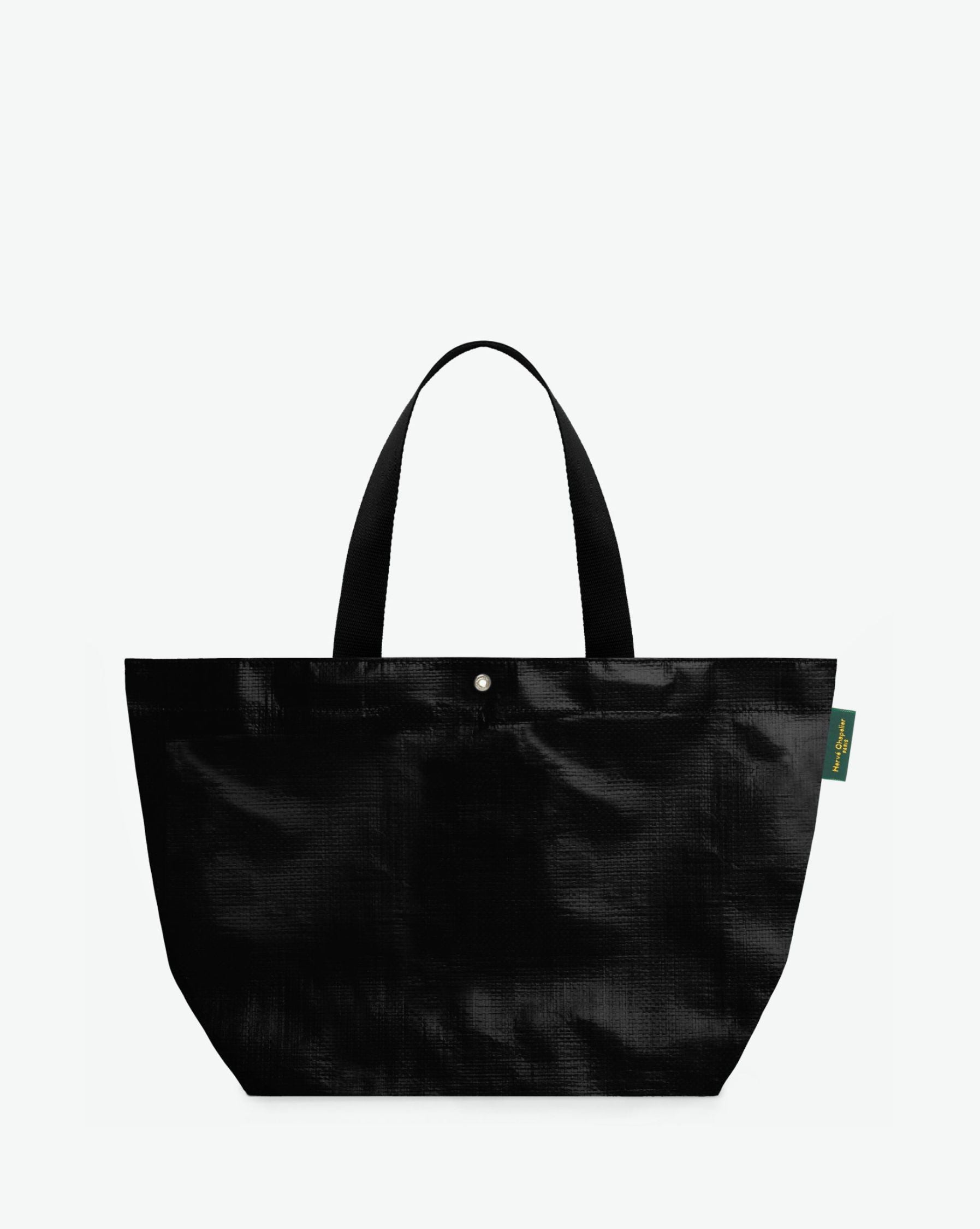Sac cabas marché coloré en polypropylène, à fond rectangulaire et dans une taille M, aux poignées longues de couleur en polyamide et à l'œillet décoratif. Idéal pour un porté à l'épaule.