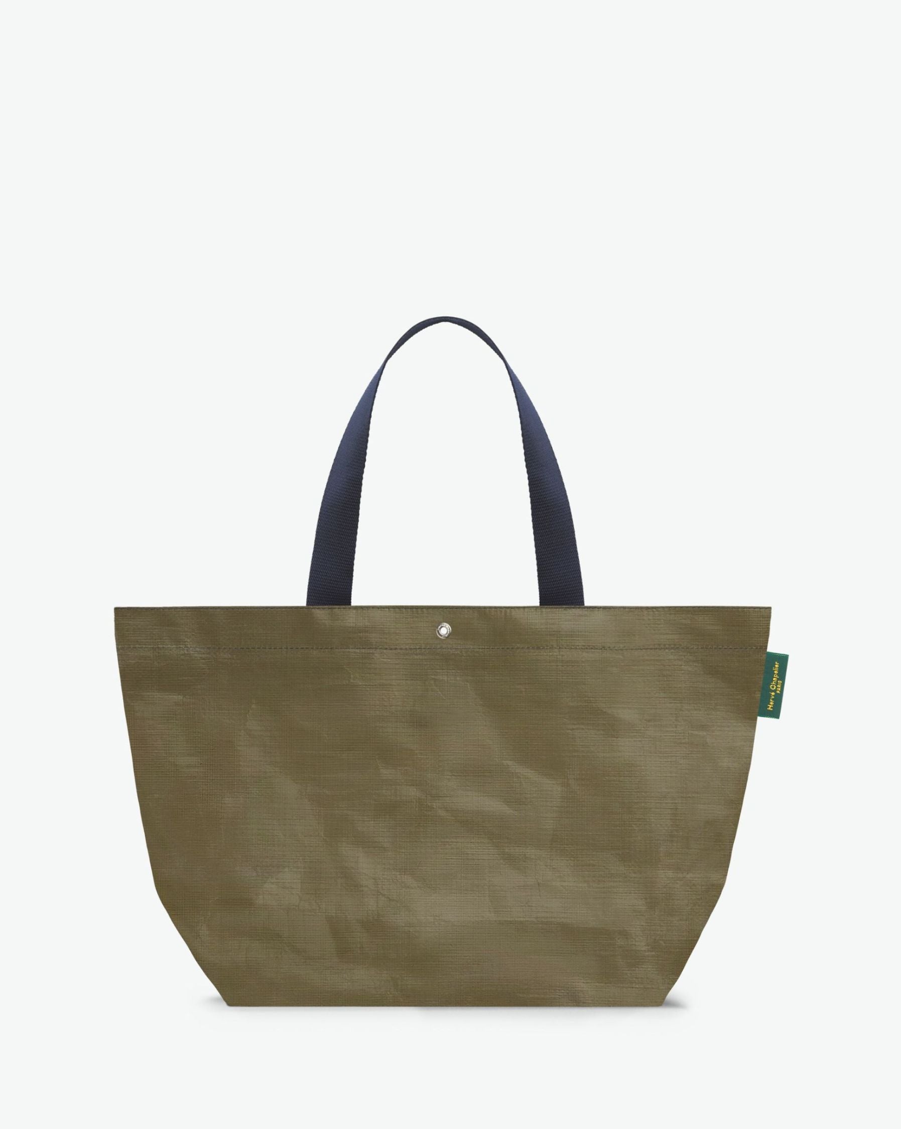 Sac cabas marché coloré en polypropylène, à fond rectangulaire et dans une taille M, aux poignées longues de couleur en polyamide et à l'œillet décoratif. Idéal pour un porté à l'épaule.
