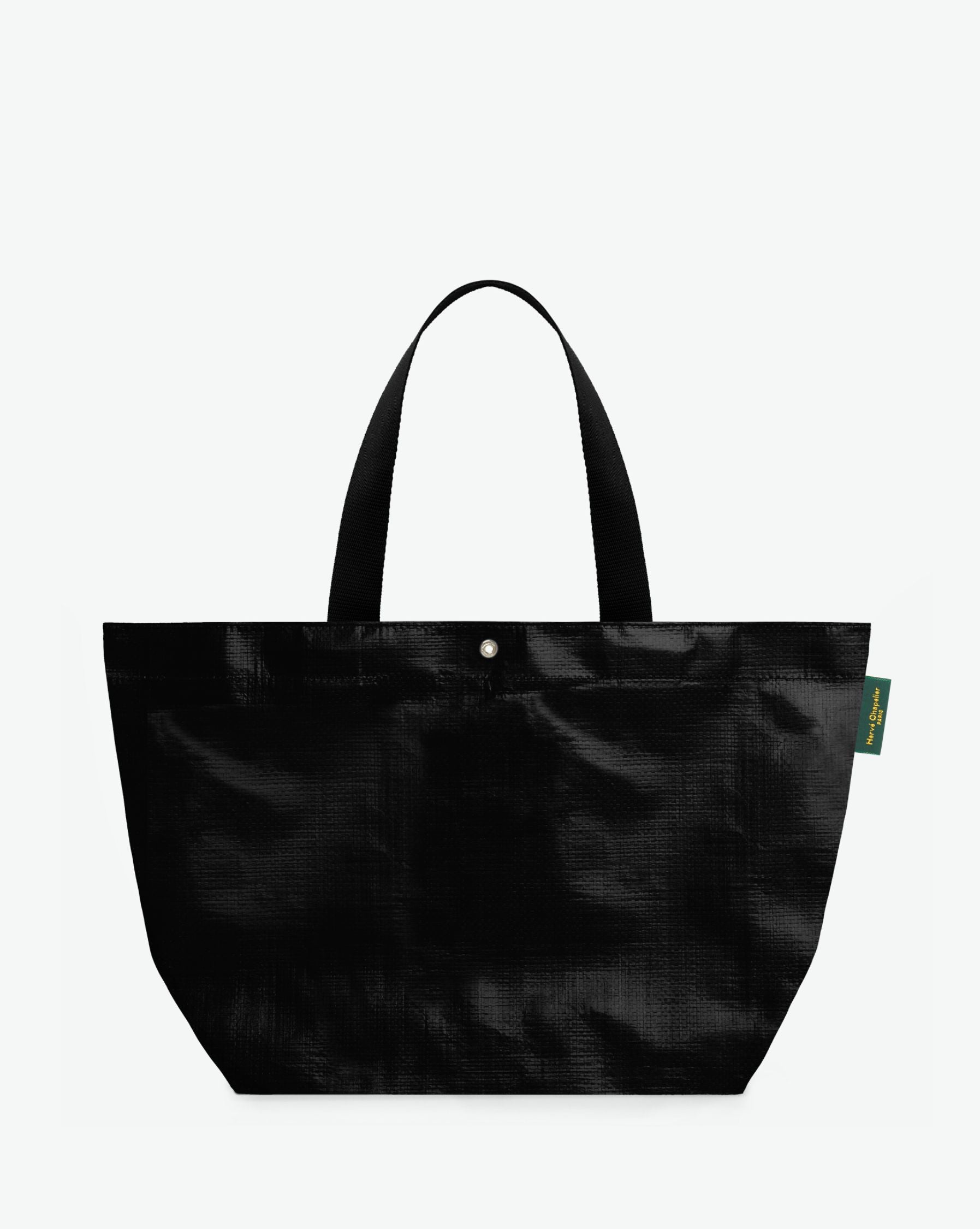 Sac cabas marché coloré en polypropylène, à fond rectangulaire et dans une taille L, aux poignées longues de couleur en polyamide et à l'œillet décoratif. Idéal pour un porté à l'épaule.
