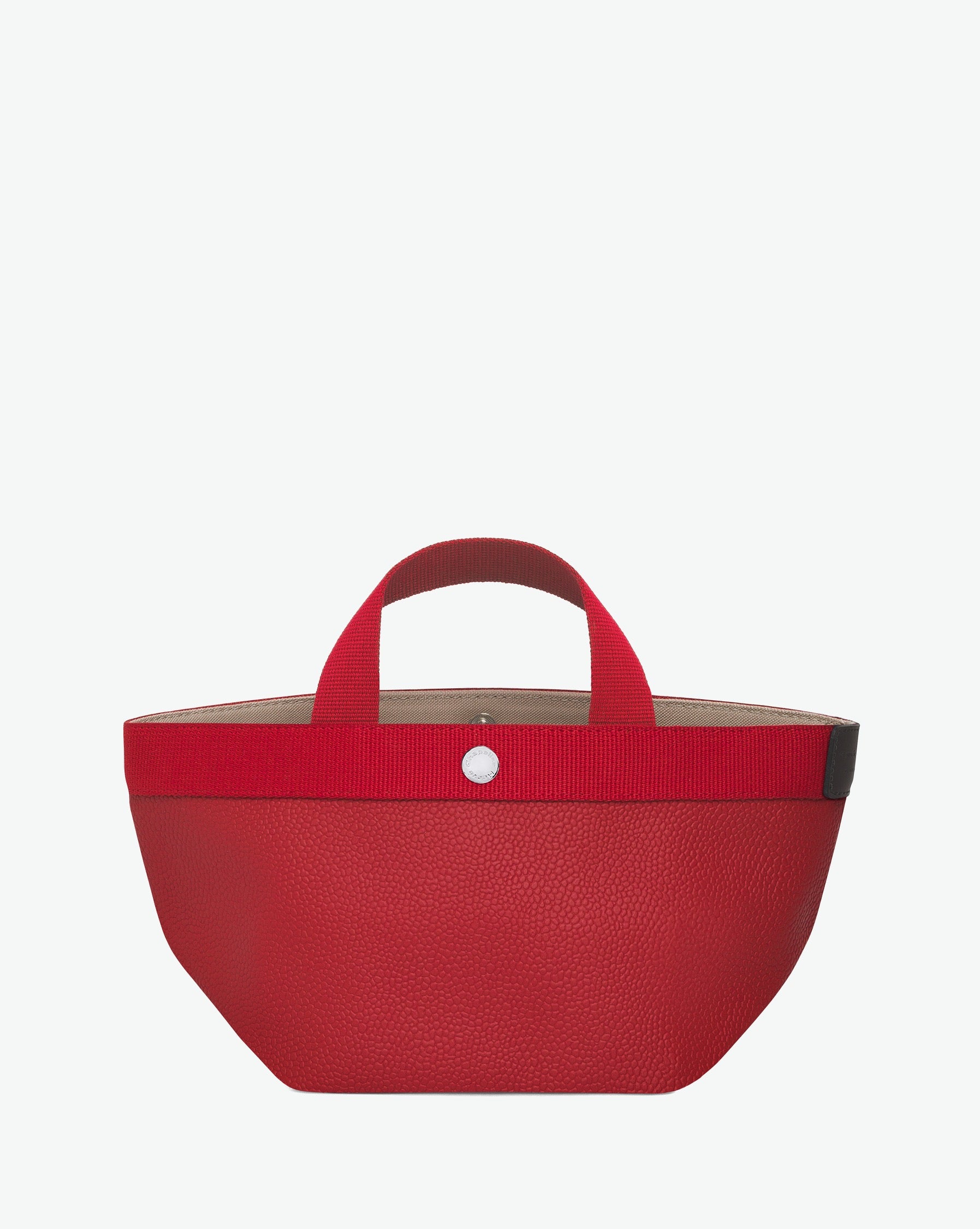 Sac à main en toile enduite grainée en taille S, au fond carré et aux poignées courtes de couleur à l'aspect coton, ainsi qu'à la poche intérieure avec bouton pression.