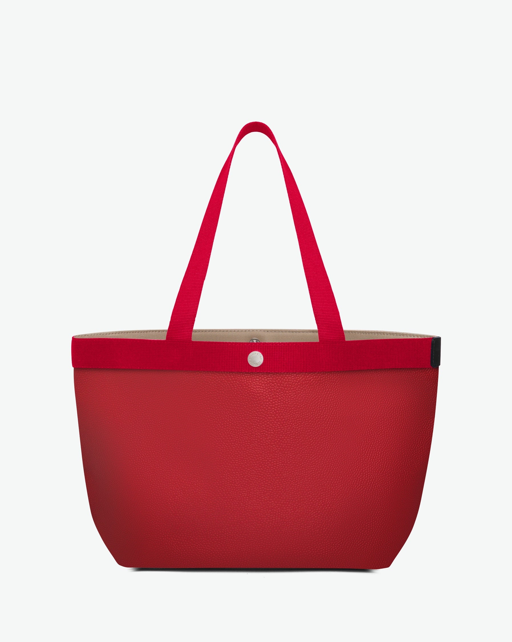 Sac à main en toile enduite grainée en taille L, au fond rectangulaire et aux poignées longues de couleur à l'aspect coton, ainsi qu'à la poche intérieure avec bouton pression.