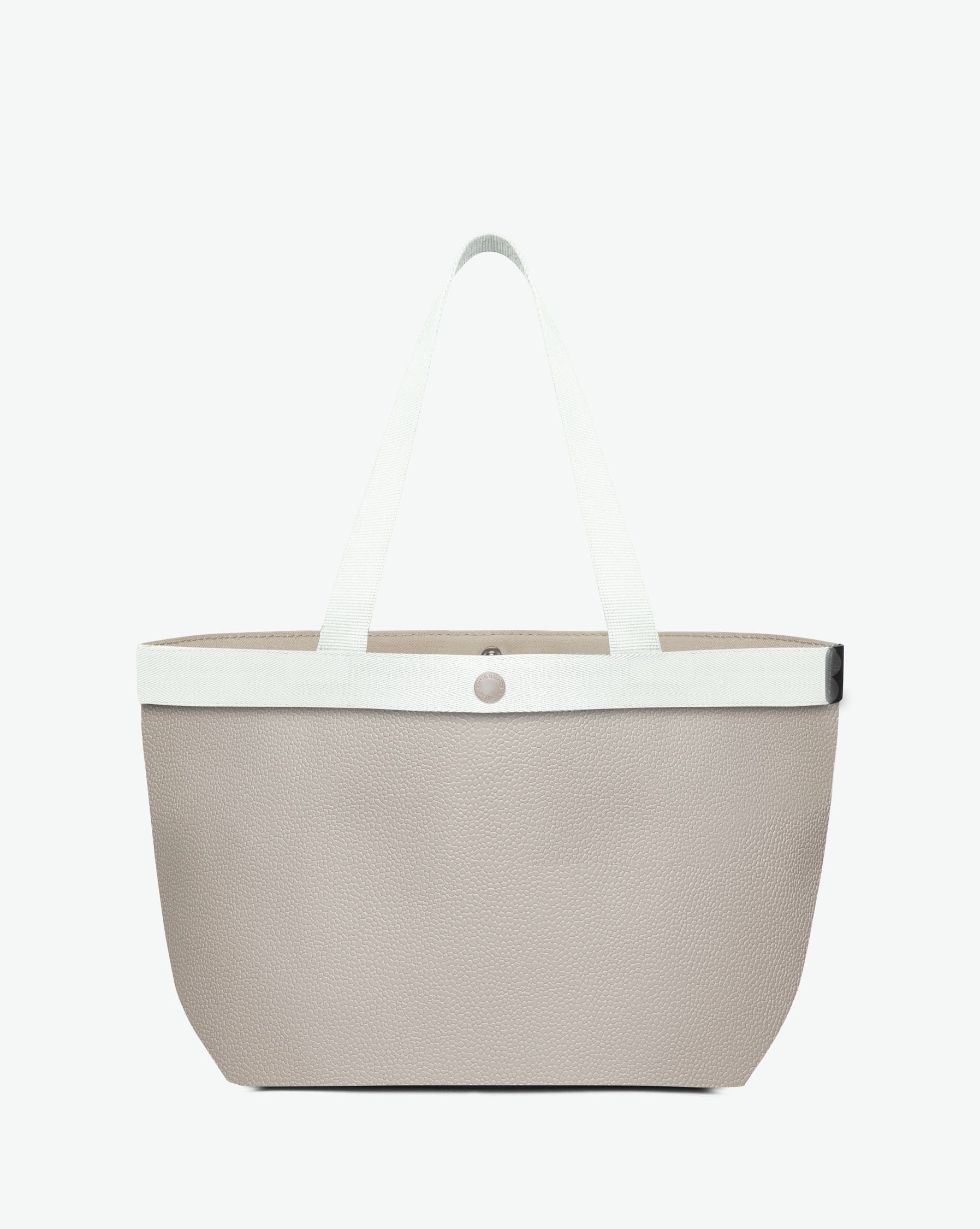 Sac à main en toile enduite grainée en taille L, au fond rectangulaire et aux poignées longues de couleur à l'aspect coton, ainsi qu'à la poche intérieure avec bouton pression.