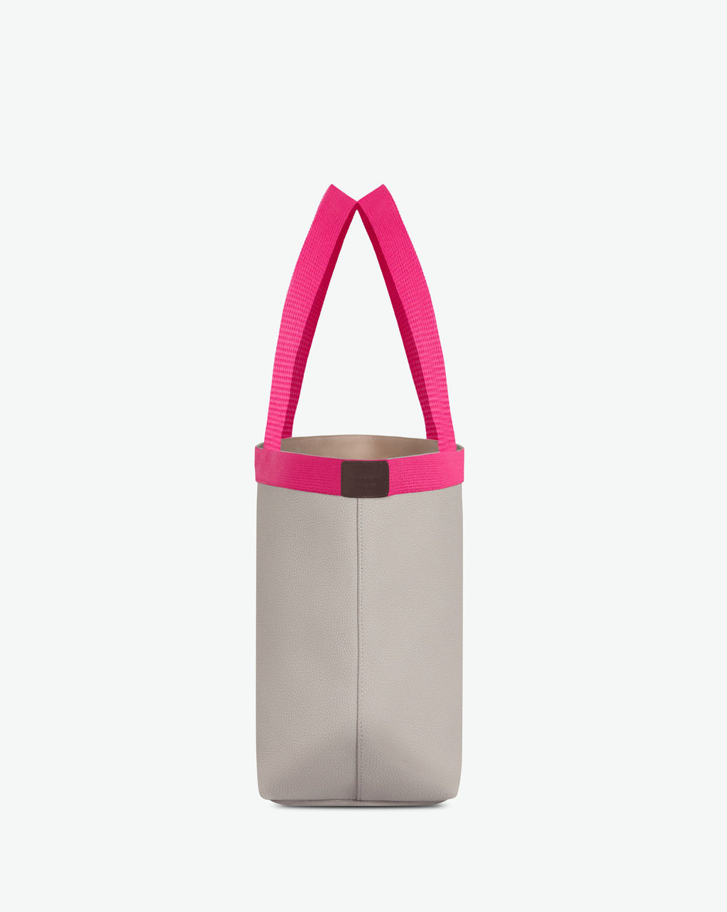 Sac à main en toile enduite grainée en taille L, au fond rectangulaire et aux poignées longues de couleur à l'aspect coton, ainsi qu'à la poche intérieure avec bouton pression.