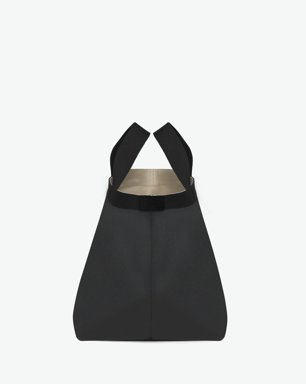 Sac à main en toile enduite grainée en taille L, au fond carré et aux poignées longues de couleur à l'aspect coton, ainsi qu'à la poche intérieure avec bouton pression.