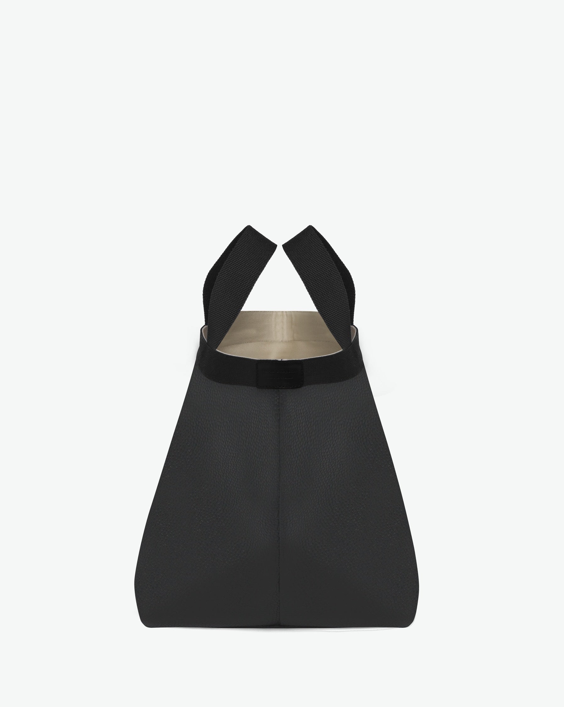 Sac à main en toile enduite grainée en taille L, au fond carré et aux poignées longues de couleur à l'aspect coton, ainsi qu'à la poche intérieure avec bouton pression.