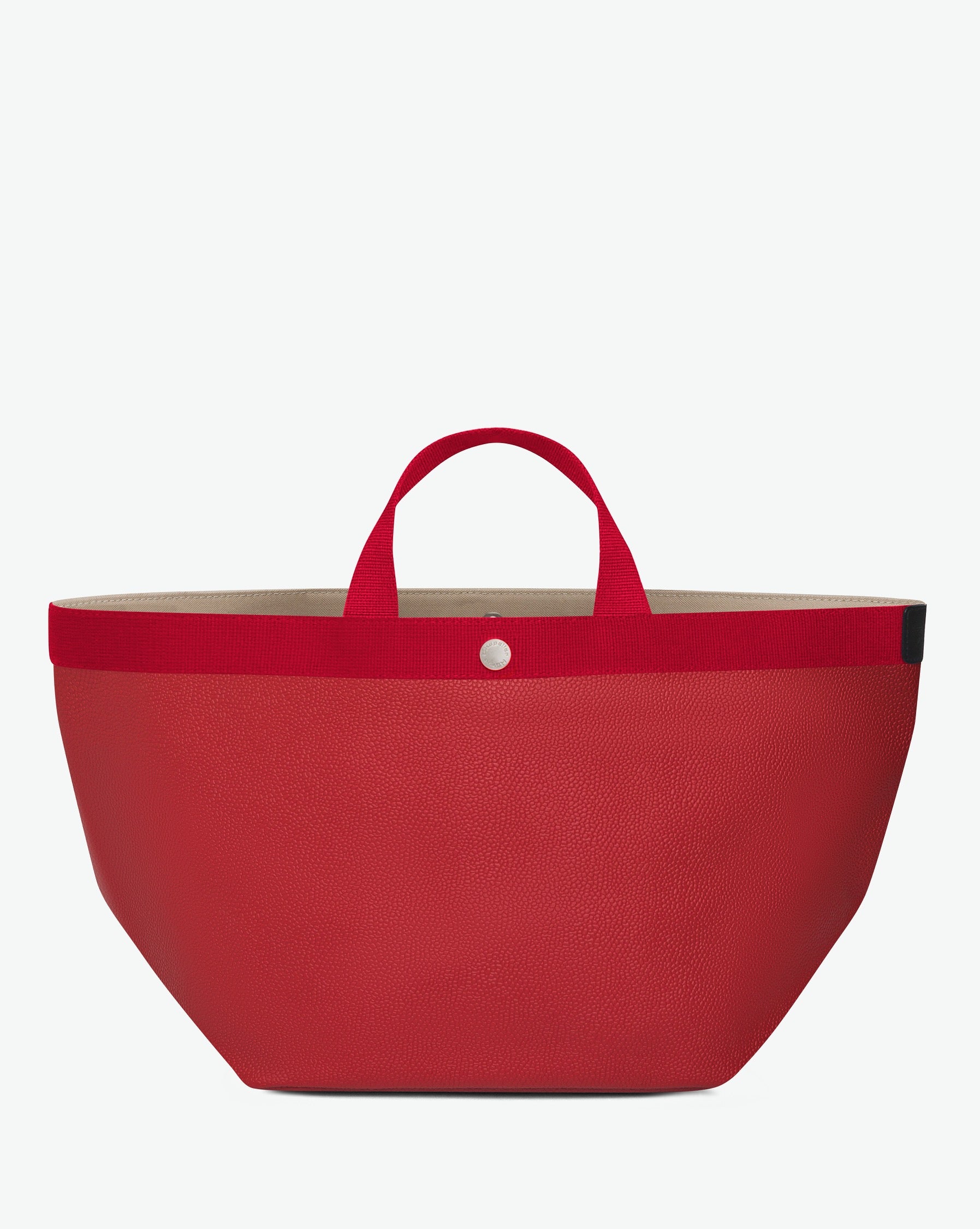 Sac à main en toile enduite grainée en taille L, au fond carré et aux poignées longues de couleur à l'aspect coton, ainsi qu'à la poche intérieure avec bouton pression.