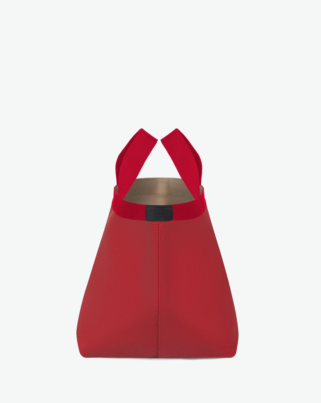 Sac à main en toile enduite grainée en taille L, au fond carré et aux poignées longues de couleur à l'aspect coton, ainsi qu'à la poche intérieure avec bouton pression.