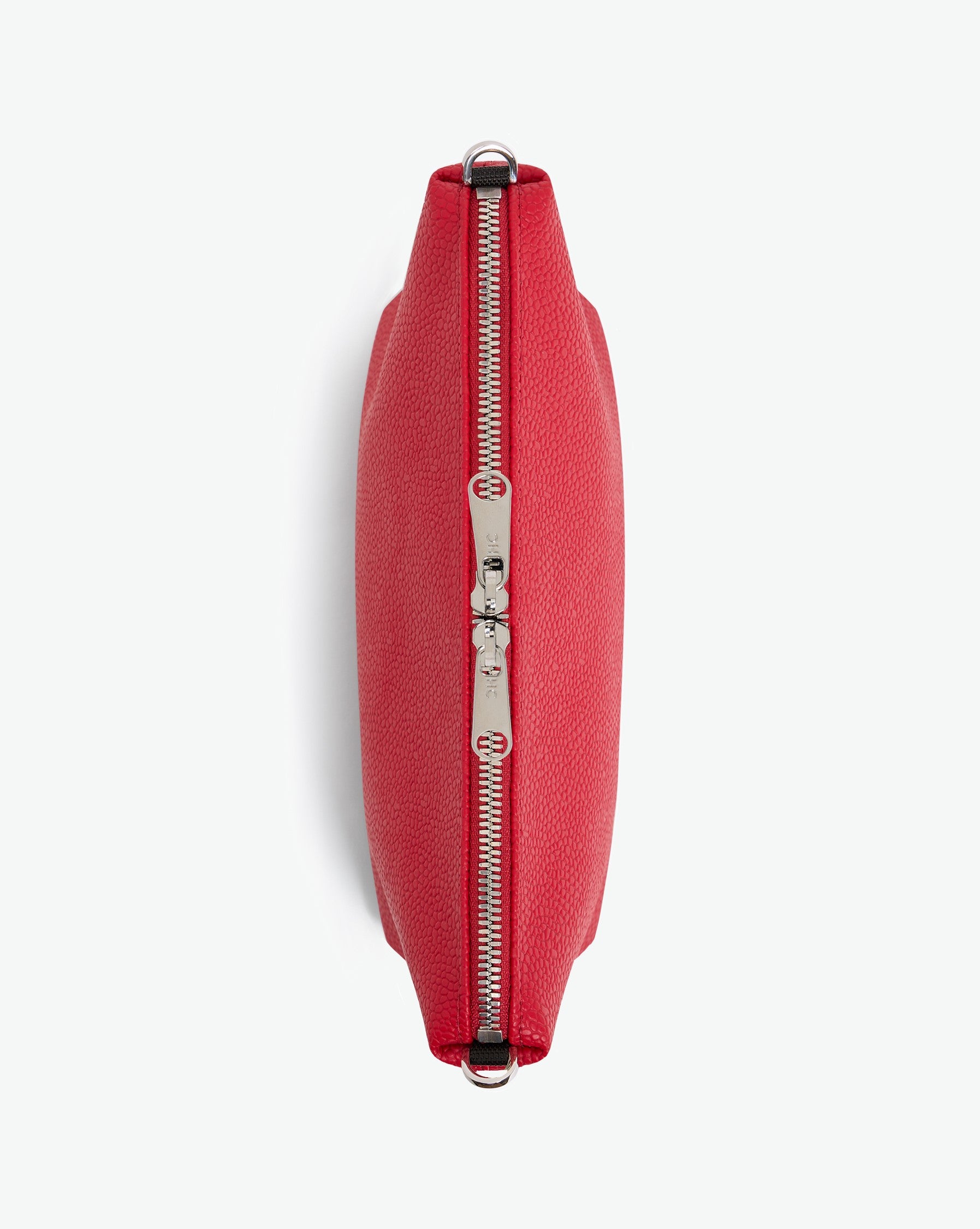 Packshot of a 8784G clutch bag pouch rectangular with a zipper and 2 rings in a small size. The tote is made of pebbled grain coated canvas. Sac pochette rectangulaire toile enduite dans une taille S