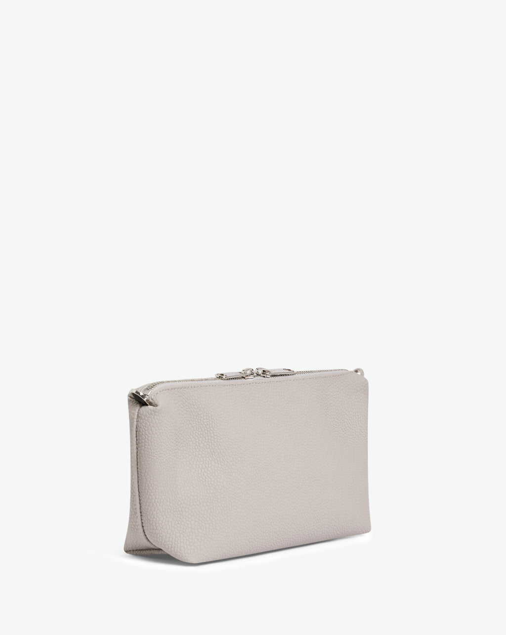 Packshot of a 8784G clutch bag pouch rectangular with a zipper and 2 rings in a small size. The tote is made of pebbled grain coated canvas. Sac pochette rectangulaire toile enduite dans une taille S