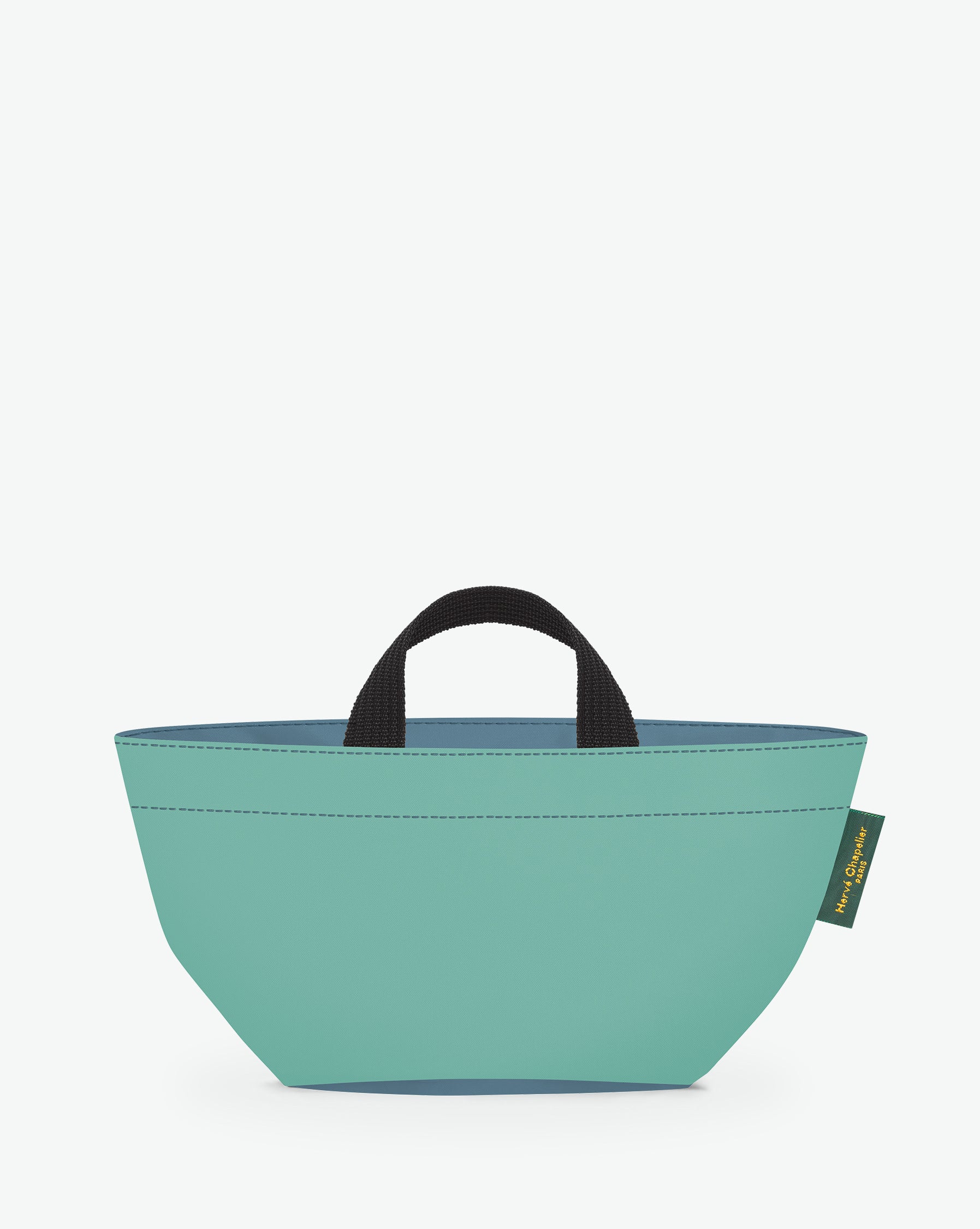 Sac à main cabas de couleur en nylon bicolore, à fond carré et dans un format S. Présence d'un double zip, de poignées courtes noires en polypropylène, et d'une étiquette de marque verte.