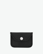 Packshot of a 905GL card holder accessory with a snap button and one inside pocket. The card holder is made of coated canvas and leather edges. Porte-cartes en toile enduite et bords en cuir dans une taille XS.