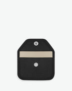 Packshot of a 905GL card holder accessory with a snap button and one inside pocket. The card holder is made of coated canvas and leather edges. Porte-cartes en toile enduite et bords en cuir dans une taille XS.