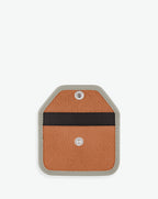 Packshot of a 905GL card holder accessory with a snap button and one inside pocket. The card holder is made of coated canvas and leather edges. Porte-cartes en toile enduite et bords en cuir dans une taille XS.