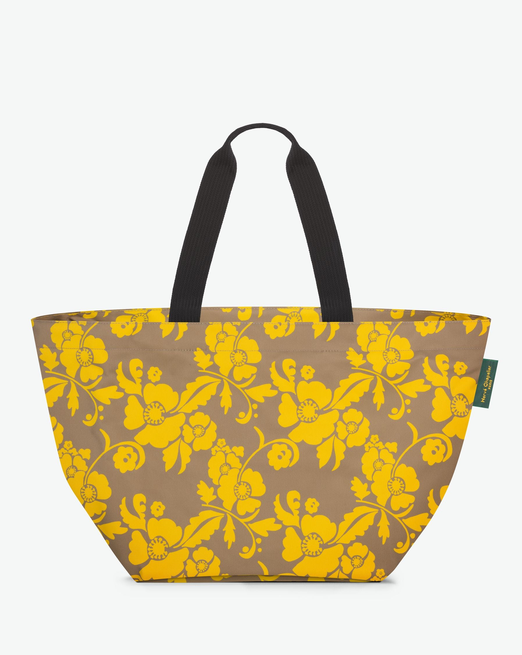 Packshot of a 913F shopping bag with long polyprop handles and a zipper and an inside pocket. The bag is made of printed nylon in a extra-large size. Sac cabas a poignees longues en nylon imprime dans un formatX L