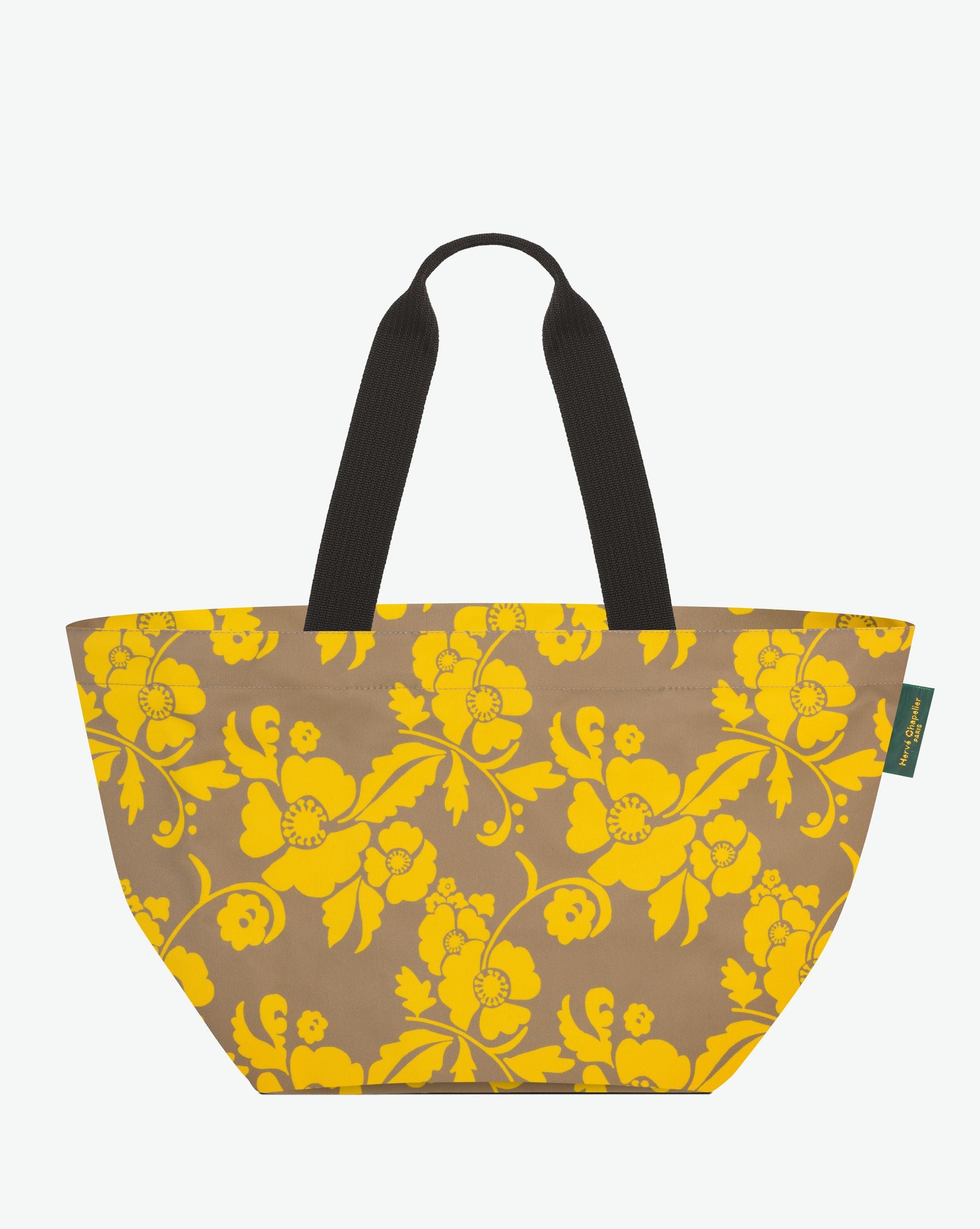 Packshot of a 925F shopping bag with long polyprop handles and a zipper and an inside pocket. The bag is made of nylon in a fancy print in a large size. Sac cabas a poignees longues en nylon imprime dans un format L