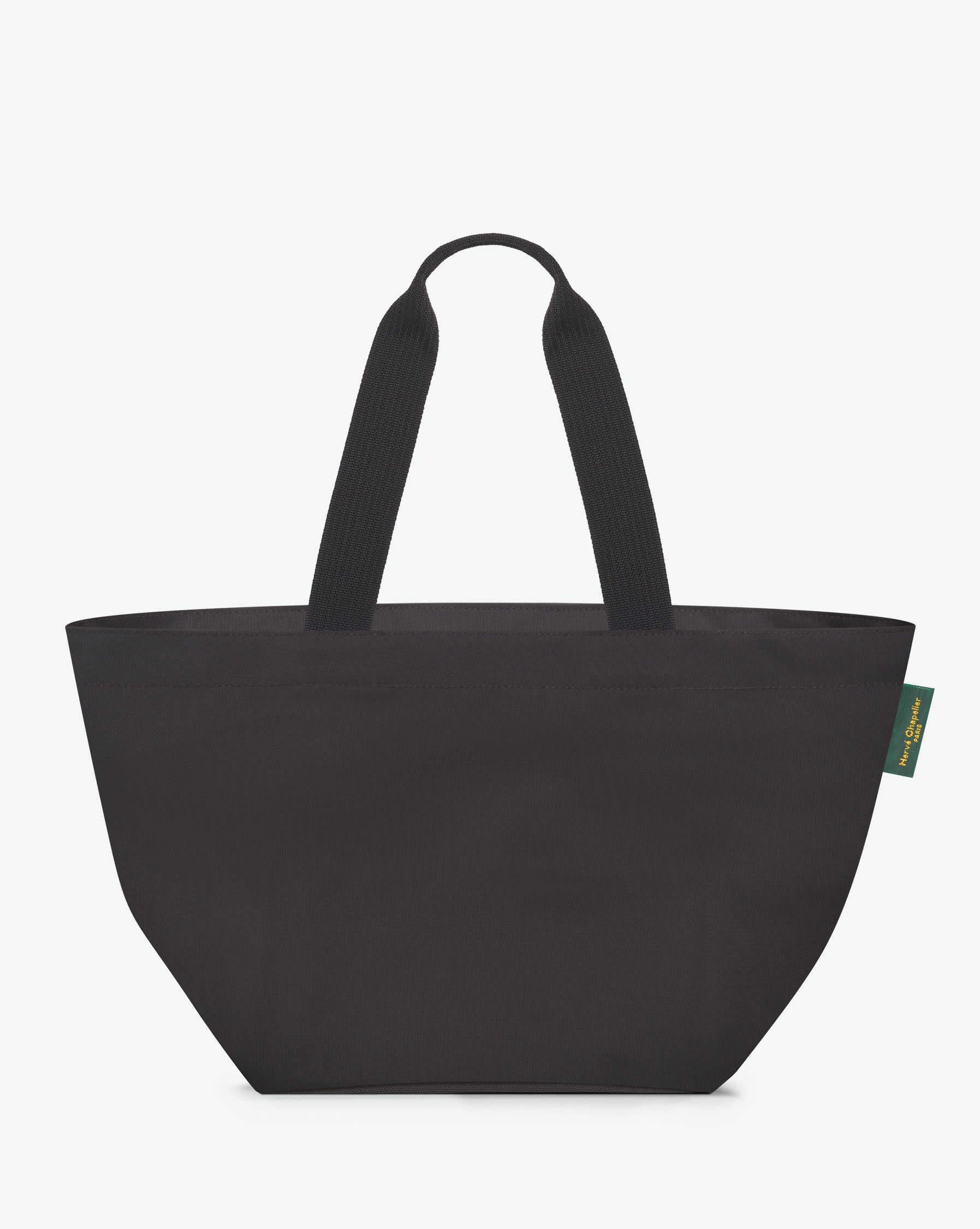Sac cabas porté épaule de couleur en nylon bicolore, à fond carré et dans un format L. Présence d'un double zip, d'anses longues noires en polypropylène, et d'une étiquette de marque verte.