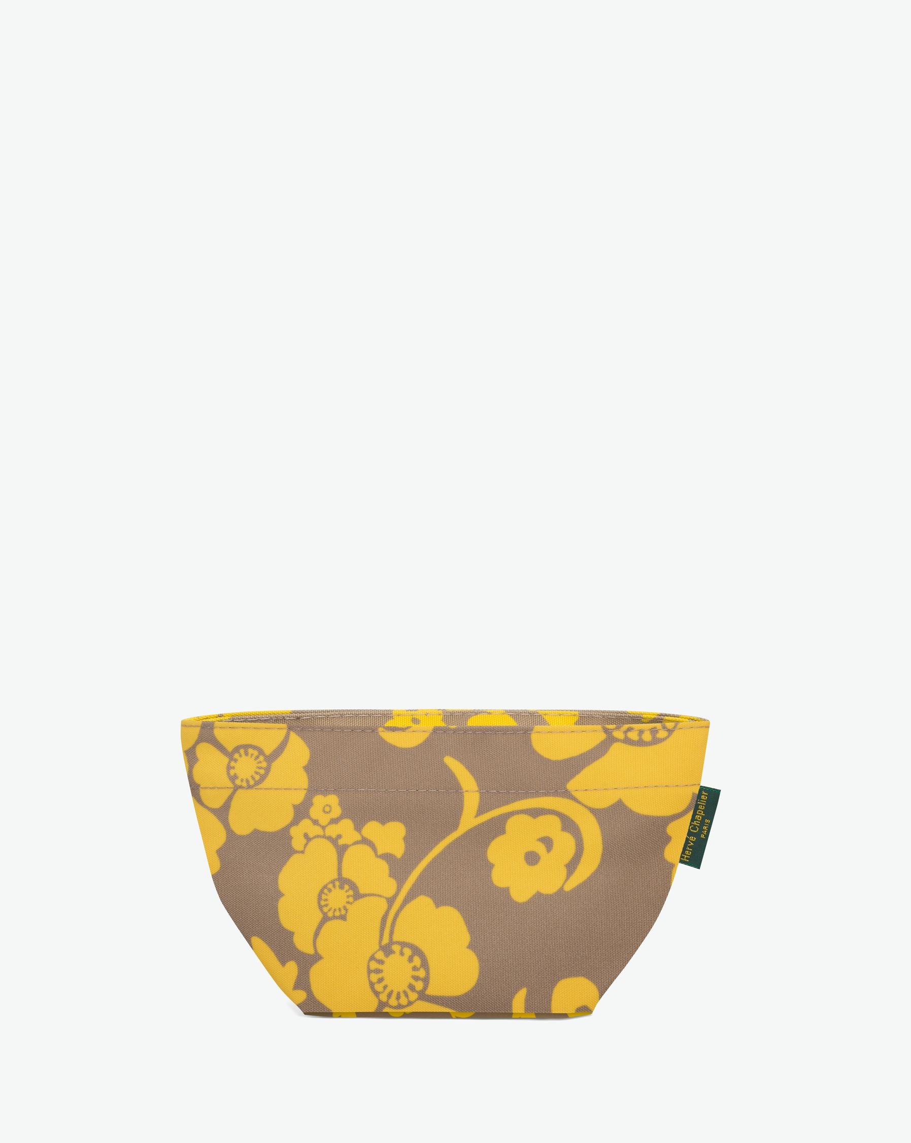 Packshot of a 927F mini tote with a square bottom and a zipper. The tote is made of printed nylon in an extra-small size. Mini cabas en nylon imprime fantaisie dans une taille XS