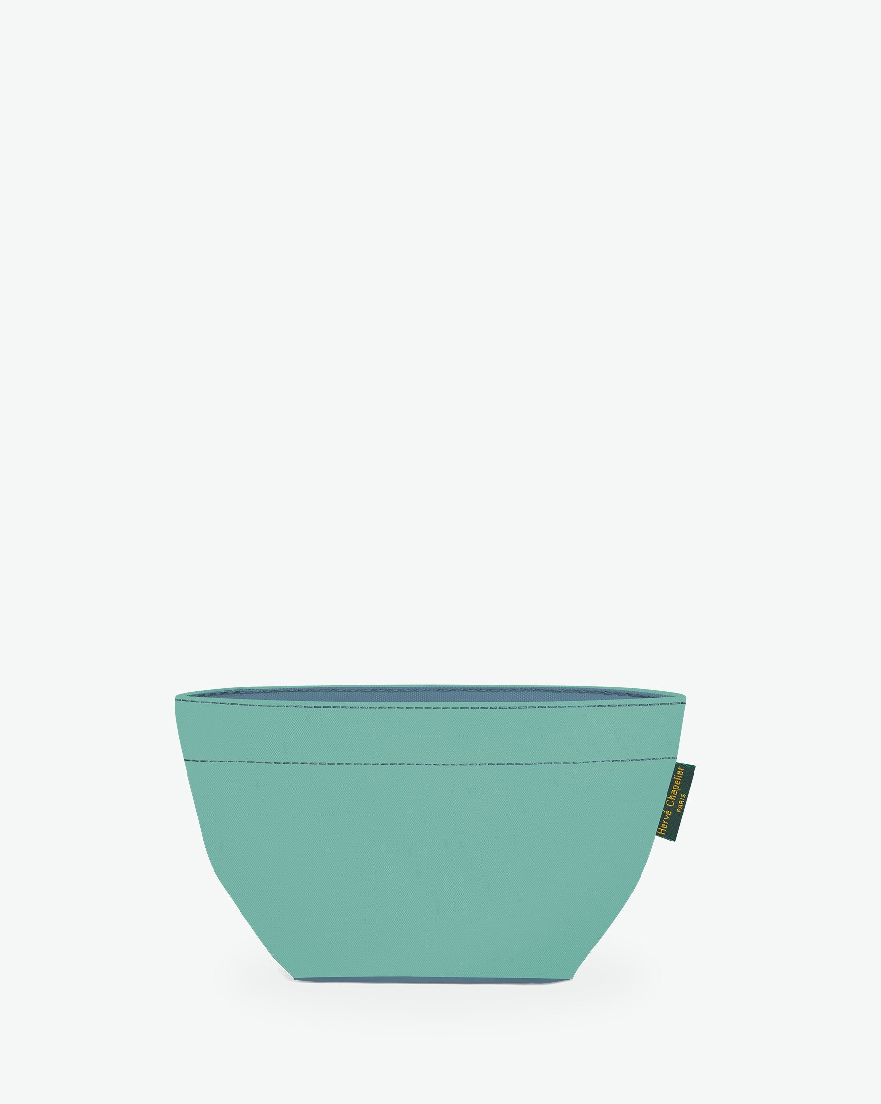 Packshot of a 927N mini tote with a square bottom and a zipper. The tote is made of solid nylon in an extra-small size. Mini cabas en nylon uni dans une taille XS