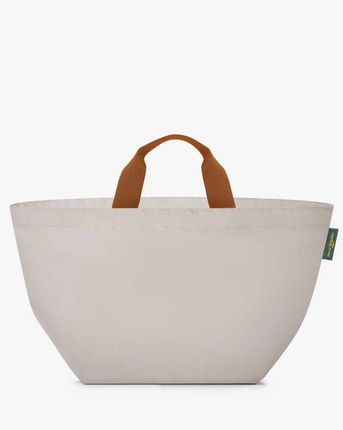 "Packshot of a 848C travel bag square bottom
with short polycotton handles and a zipper and an inside pocket.
This extra-large bag is made of solid polyamide.
Sac cabas a poignees courtes en polyamide uni format XL"