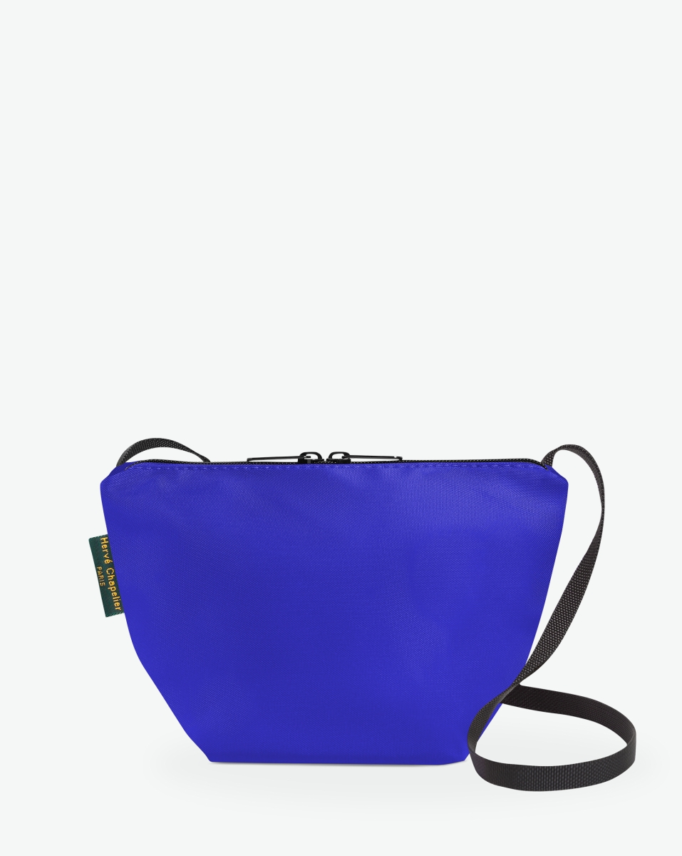 Hervé Chapelier -  - "Packshot of a 2885N shoulder crossbody bag
with a long handle in polyamide webbing and a zip with double closure.
The bag is made of solid nylon in a small size.
Sac bandouliere epaule en nylon uni taille S"