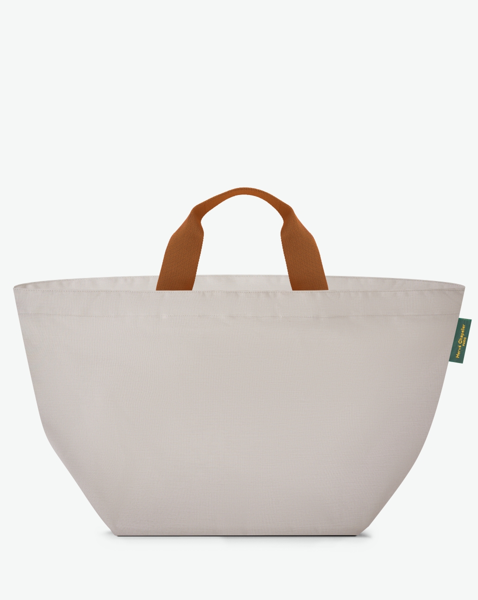 Hervé Chapelier -  - "Packshot of a 848C travel bag square bottom
with short polycotton handles and a zipper and an inside pocket.
This extra-large bag is made of solid polyamide.
Sac cabas a poignees courtes en polyamide uni format XL"