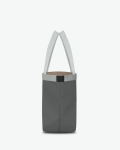 "Packshot of a 708GP shopping bag rectangular bottom
with short polycotton handles and webbing and a snap button.
The bag is made of pebbled grain coated canvas.
Sac cabas a poignees courtes en toile enduite format L"