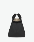 "Packshot of a 725GP tote bag
with short handles and polycotton webbing and an inside pocket.
The bag is made of pebbled grain coated canvas in a large size.
Sac cabas en toile enduite dans un format L"