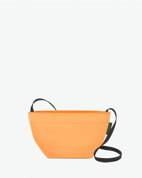 Hervé Chapelier -  - Visual on a white background of a shoulder bag standing upright and straight, with a long handle and a zip with double closure. The bag is made from nylon fabric in orange colors. The Hervé Chapelier label is affixed to the left-hand side.
