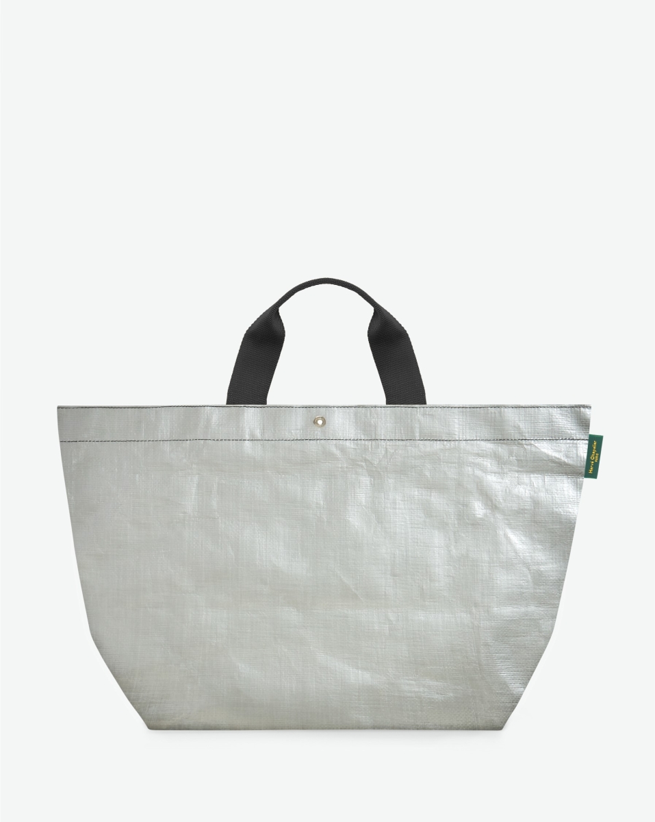 Hervé Chapelier -  - "Packshot of a 2014PP market tote bag
with short polyamide handles and a rectangular bottom.
The bag is made of polyethylene in a large size.
Sac cabas marche a poignees courtes en polyethylene format L"