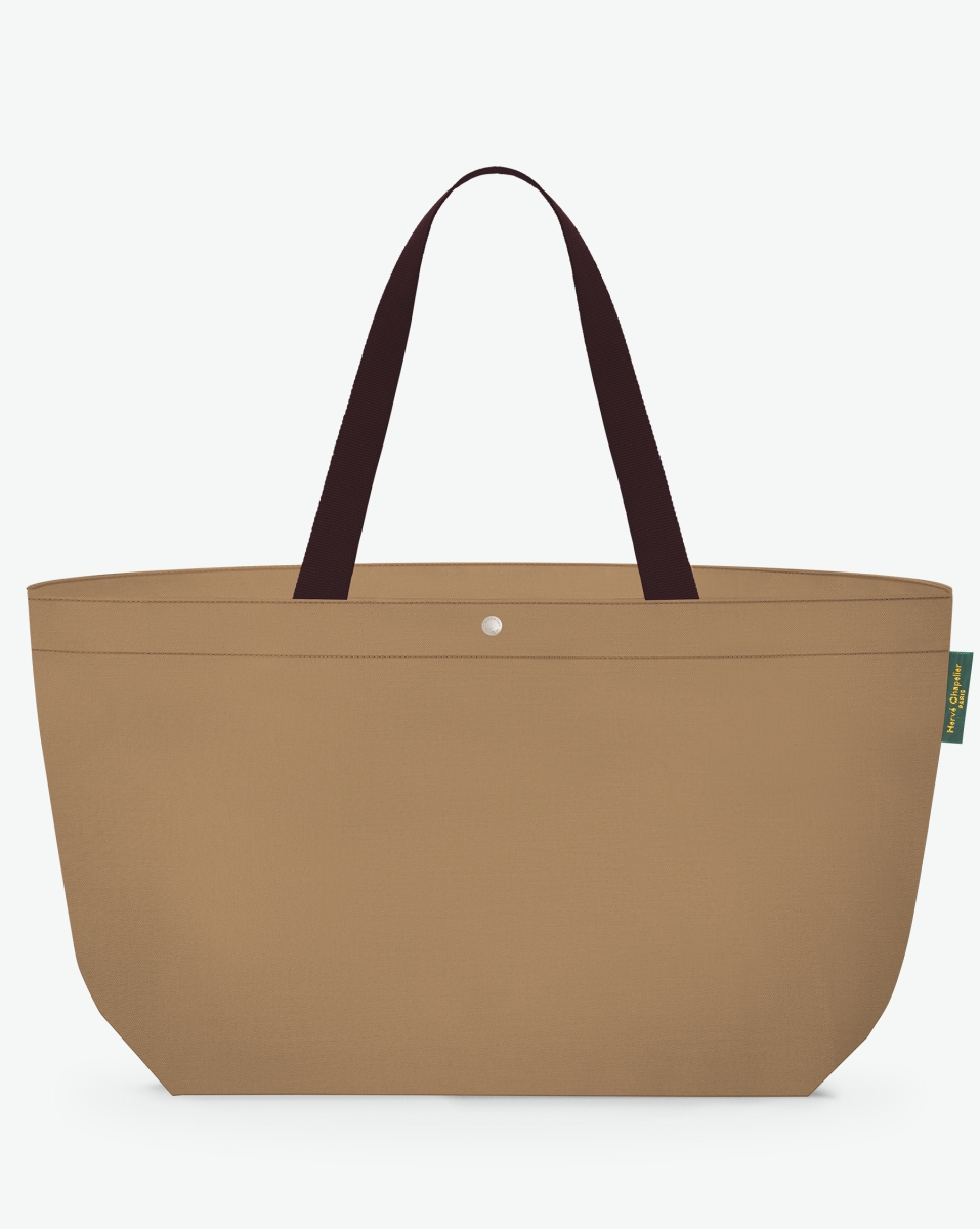 Hervé Chapelier -  - "Packshot of a 2839C travel bag rectangular bottom
with long polycotton handles and a zipper and an inside pocket.
This extra-large bag is made of solid polyamide.
Sac cabas a poignees courtes en polyamide format XL"